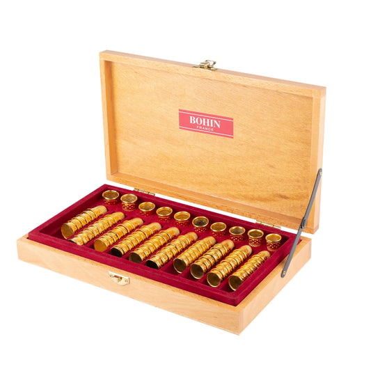 WOOD CASE+80 GOLD THIMBLES